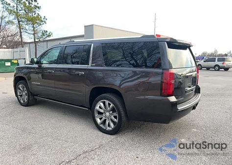 2015 Chevrolet Suburban C1500 Ltz from USA, damaged, VIN 1GNSCKKC1FR519590